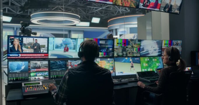 TV Station Production Control Room Live News Show as Broadcast Technicians Manage Monitoring, Vision Switching, Feed Routing, Graphics Integration, Entertainment, Weather Forecasts, Sports Coverage
