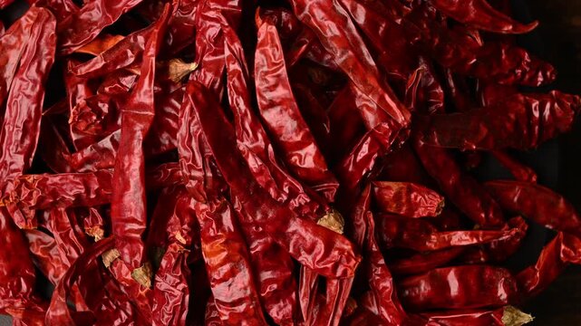 Rotating Top View of Dry Red Chili Texture &ndash; Spicy Background Footage