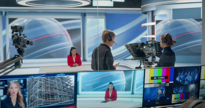 Backstage TV Station Production Control Room Captures Crew Cueing Cameras, Signaling Countdowns, Framing Anchor, Checking Monitoring Program, Preview, Signal Screens to Launch a Live News Broadcast