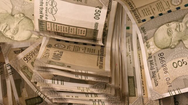 Rotating 500 Indian Rupee Notes Texture &ndash; Top View Currency Background