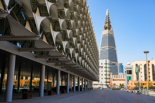 The innovative facade of King Fahad National Library with Al Faisaliah Tower in Riyadh, Saudi Arabia