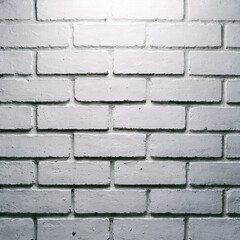 Fototapeta premium A close-up view of a white brick wall with a spotlight shining on it