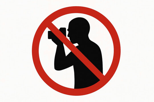 Explicit prohibition of photography captured for adobe pics, a clear warning graphic against image capture in designated zones