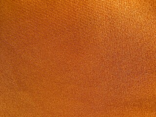 Fototapeta premium Orange fabric texture background 