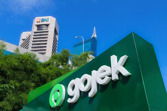 Gojek sign in Jakarta with city skyscrapers in the background on March 27, 2026 in Jakarta, Indonesia