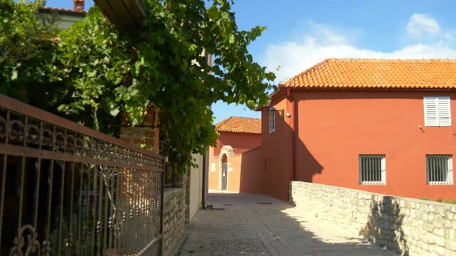 Quiet Mediterranean street with traditional houses in Croatia