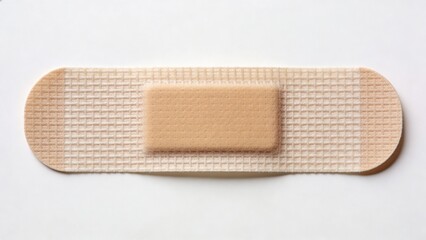 features a single adhesive bandage, commonly known as a band-aid, against a plain white background. The bandage is rectangular with rounded ends, measuring approximately 7 centimeters in length. It is