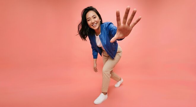 Colorful and energetic studio portrait of a person in casual fashion posing creatively 9