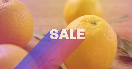 Displaying large ripe orange showing textured peel on wooden countertop, with SALE graphic stripes © vectorfusionart