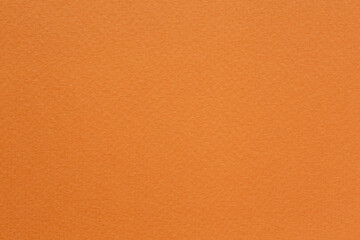 close up of orange color craft paper texture