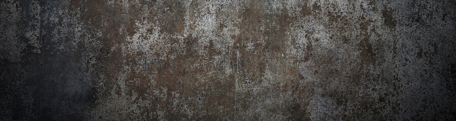 Fototapeta premium A vintage brown bear fur texture provides a rough and grungy backdrop with an aged, textured pattern reminiscent of a dirty stone surface
