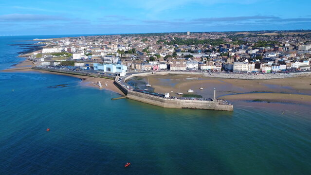 Margate Seawall and Lighthouse at Low Tide in Kent England