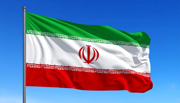 Iranian flag waving in clear blue sky, symbolizing national identity and pride.