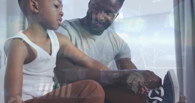 Vertical video: Child offering foot, father tying sneaker, building family bond with HUD overlay