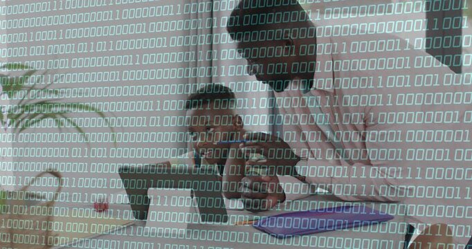 Child tapping keyboard, adult male leaning over guiding boy at laptop, binary overlay teaching code