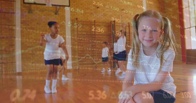 Seated girl watching peers starting PE class, with data overlay tracking movements and orange ball