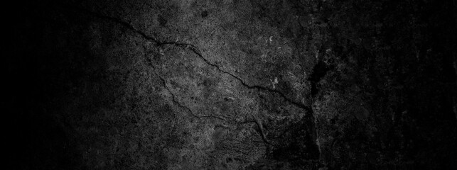 A dark wood and black grunge texture features an aged stone pattern on a rough vintage surface with cracked grey concrete and dirty marble backgrounds © shan