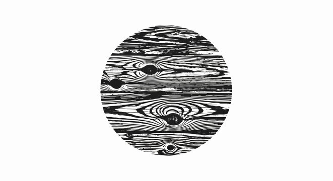 Oval shaped black and white wood grain pattern with knots