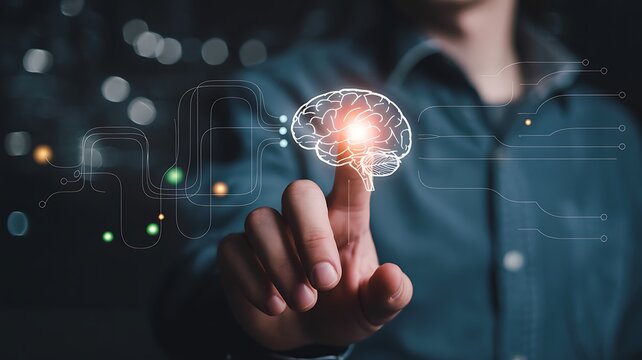 Person touching glowing brain icon on digital interface representing artificial intelligence and neural network