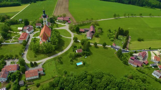 Aerial view of the church Wallfahrtskirche Heilige Dreifaltigkeit &ndash; Eichlberg (Hemau) in Germany, Bavaria on a sunny day day in Spring