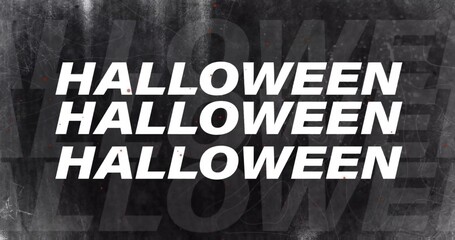 Displaying stacked white HALLOWEEN type dominating center grunge poster, with scratches, red specks