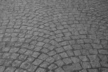 Stone pavement texture in perspective. Abstract background of old cobblestone pavement. Old Stone Pavement Texture Backdrop, Granite Cobblestone Road Pattern, Vintage Block Sidewalk