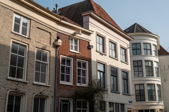 Historic dutch buildings lining marspoortstraat in zutphen