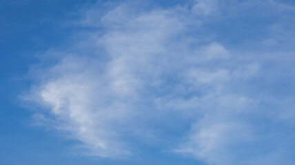 Obraz premium Clear Blue Sky With Wispy Clouds