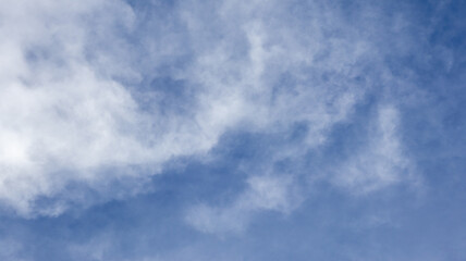 Fototapeta premium Wispy Clouds in a Blue Sky