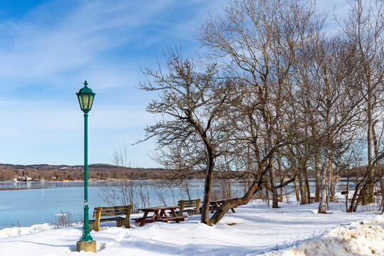 Lamp post on a winter day in front of Stockton Harbor in Maine.