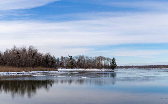 Upper Stockton Harbor winter view with blue sky and wispy clouds