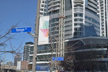 Obraz premium Waterfront banner at Yonge St and Harbour St with view of SkyTower Pinnacle One Yonge St, Toronto