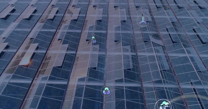 HUD overlays animating over glass facade, triggered by data pulse, showing eco metrics