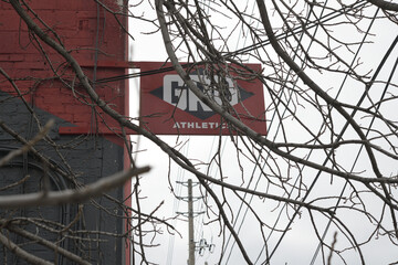 Obraz premium wall mounted projecting sign outside GRIT Athletics Toronto Inc, 53 Laird Dr, East York, Toronto