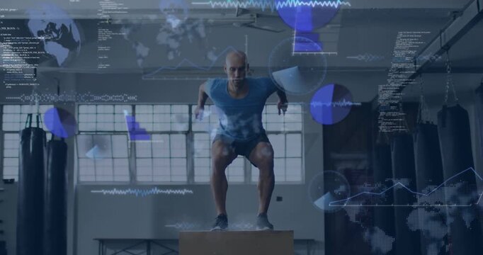 Mid-adult man blue tee bracing behind plyo box in gym, performing training jumps while HUD tracking