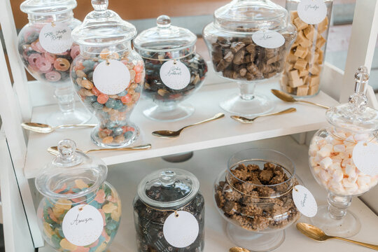 The amazing dessert table for a luxury party, wedding candy bar