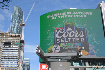Obraz premium digital billboard advertising for Coors Seltzer Slushie Flavours, on the exterior of The Tenor, facing Sankofa Square, Toronto