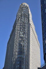 Obraz premium front view of The Esplanade, a 33-storey Postmodern residential condominium designed by Matsui Baer Vanstone, located at 25 The Esplanade (at Yonge St) in Toronto