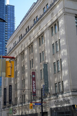Obraz premium facade of College Park, a shopping mall (formerly Eaton's College Street), with wall mounted banners for Metro supermarket at 444 Yonge St, Toronto