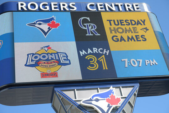 Rogers Centre Gardiner LED pylon sign with Toronto Blue Jays game promotion