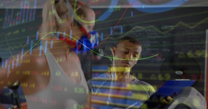 Trainer starting treadmill, woman running, monitoring and noting while charts updating fitness VO2