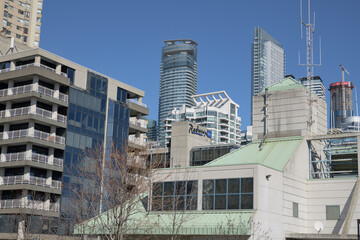 Naklejka premium wide view of Radisson Blu Toronto Downtown, a four star hotel, located at 249 Queens Quay W, Toronto (looking east from about HTO Beach)