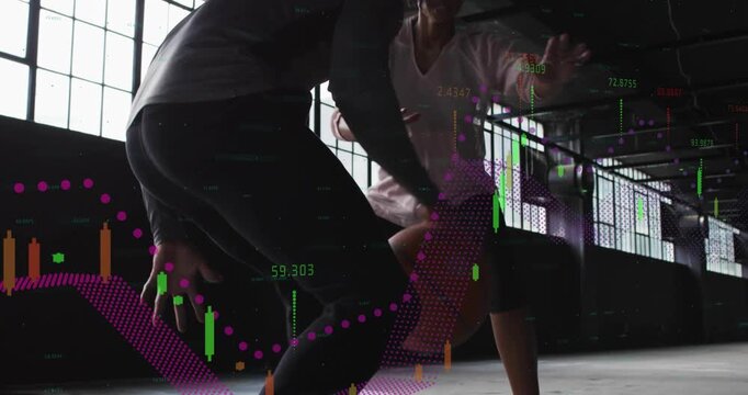 Vertical video: Man initiating dribble and woman defending in basketball drill, data graphs growing