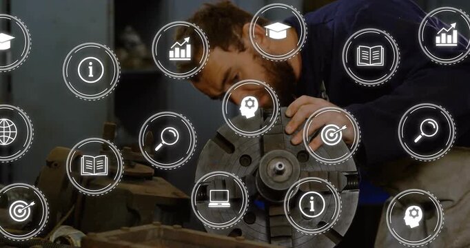 Responding to HUD icons appearing, male tech in navy shirt adjusting lathe chuck at machine shop
