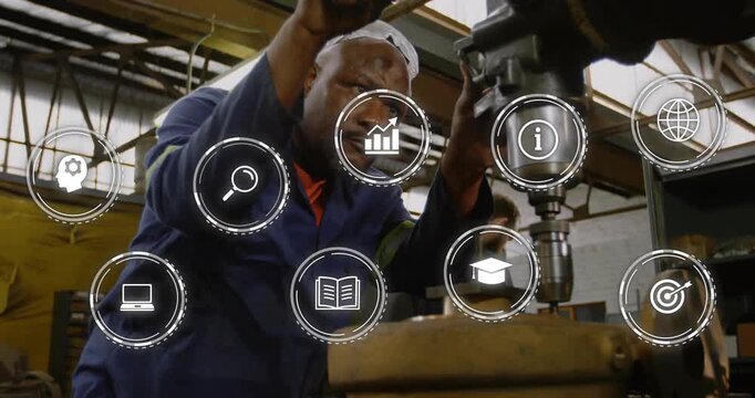 Male machinist operating drill press checking quality in factory as UI icons appearing covering him