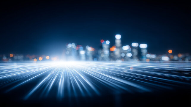Light trails racing toward a distant city skyline representing speed, data transmission, and the future of high performance connectivity.
