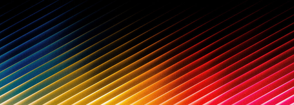 Grainy colorful diagonal gradient stripes pattern transitioning through spectrum of rainbow colors on black background