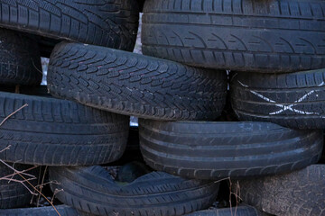 pile of black car tyres
