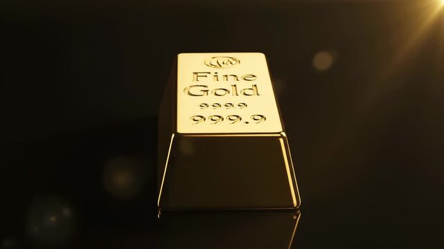 Gold bar rests on black surface reflecting light. Close up details highlight craftsmanship and value. Concept of banking, finance, investment, wealth creation