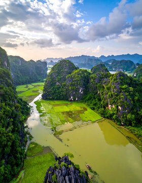 Aerial View of Ninh Binh, Vietnam - A Landscape of Limestone Karsts and Green Rice Fields.